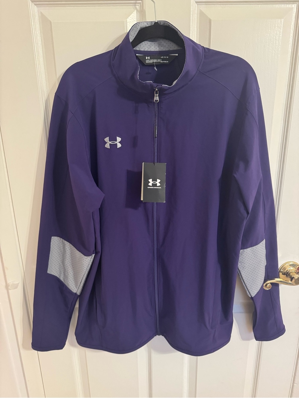 NWT Under Armour men's golf jacket size large. Purple. Water repellent.